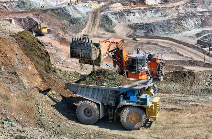 Australia Loading of iron ore on very big dump body truck Australia Loading of iron ore on very big dump body truck