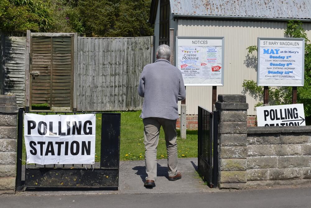 GBP A voter visits a polling station at a church. Voters are electing members for Scottish Parliament Welsh Assembly Northern Ireland Assembly and English Local Councils. GBP A voter visits a polling station at a church. Voters are electing members for Scottish Parliament Welsh Assembly Northern Ireland Assembly and English Local Councils.