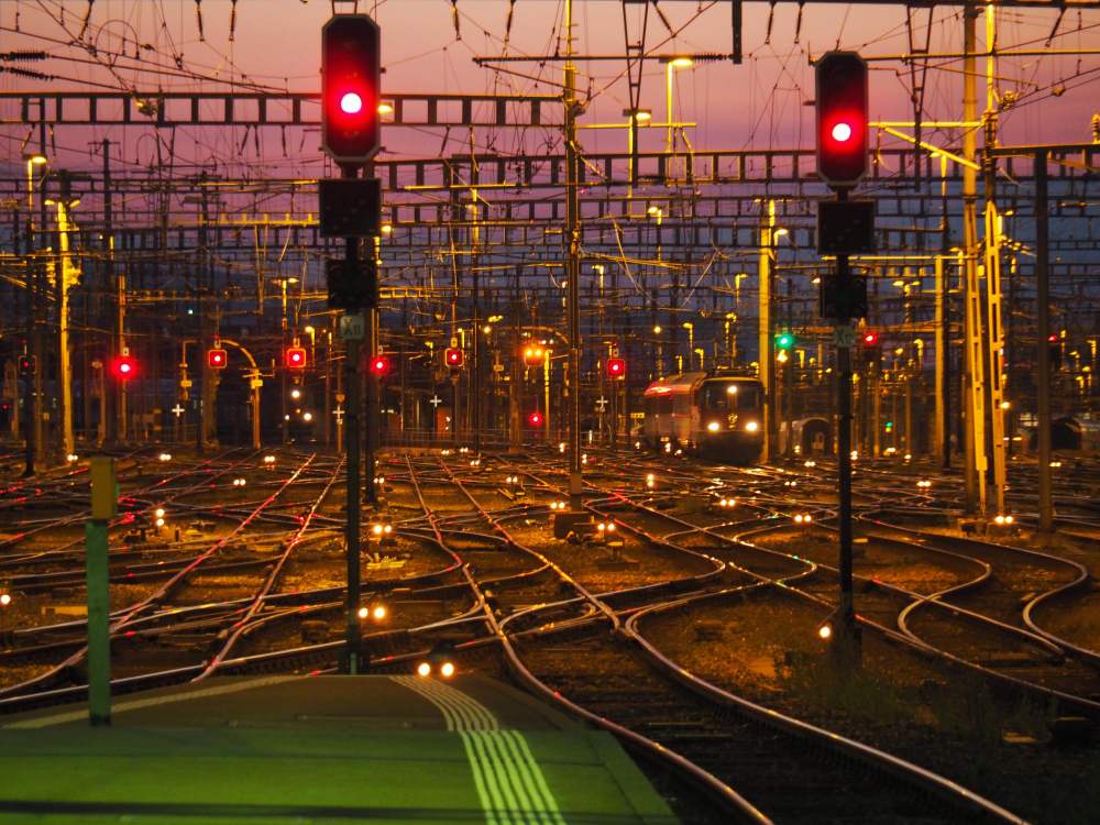 Train on illuminated railroad tracks Train on illuminated railroad tracks