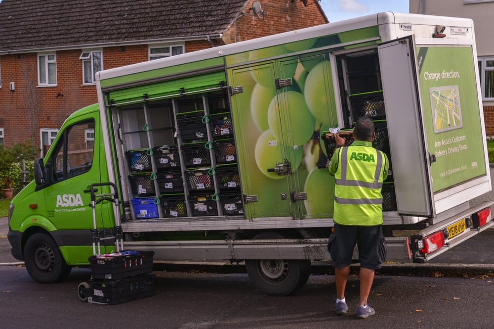 UK Bournemouth A driver of ASDA retailer gets groceries ready for delivery UK Bournemouth A driver of ASDA retailer gets groceries ready for delivery