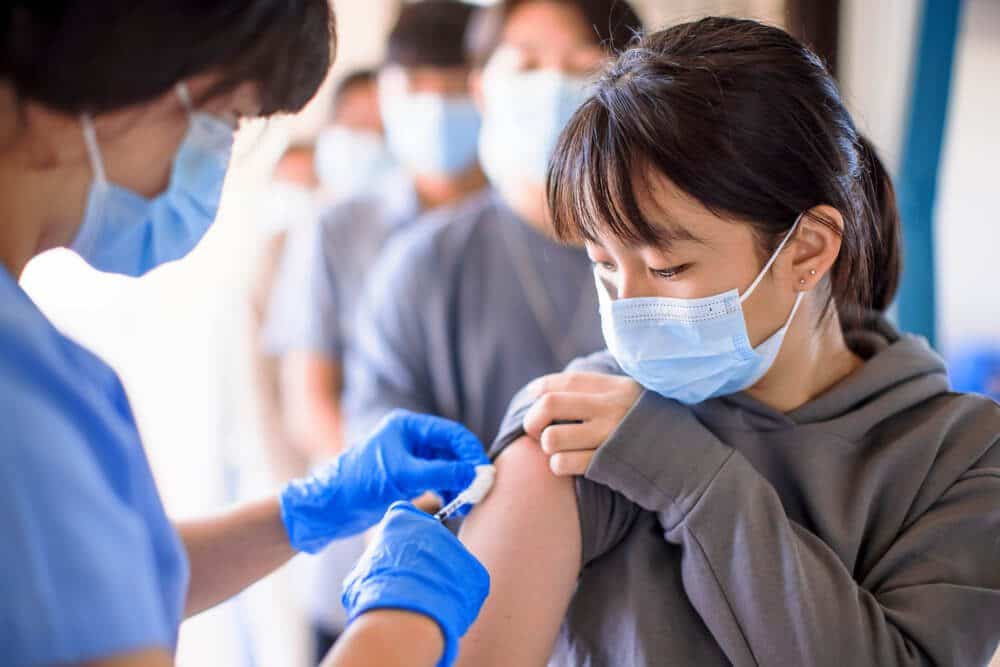 coronavirus injection to group of people coronavirus injection to group of people