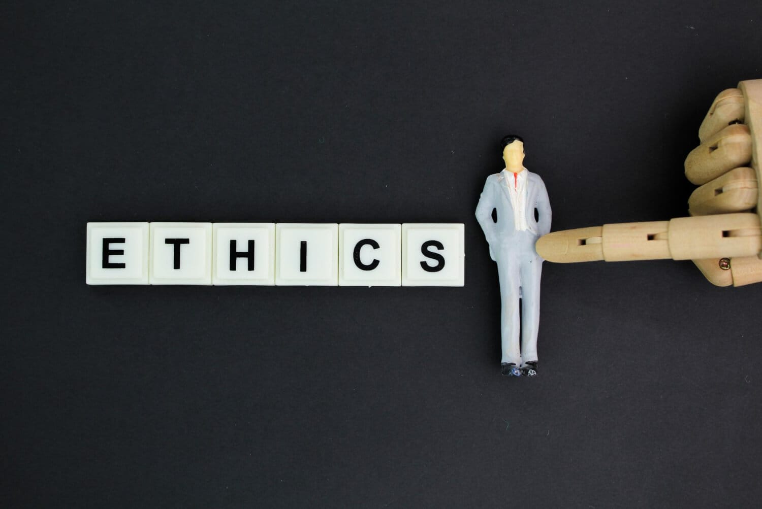 miniature people with word ethics concept ethics work ethics industry (1) miniature people with word ethics concept ethics work ethics industry (1)